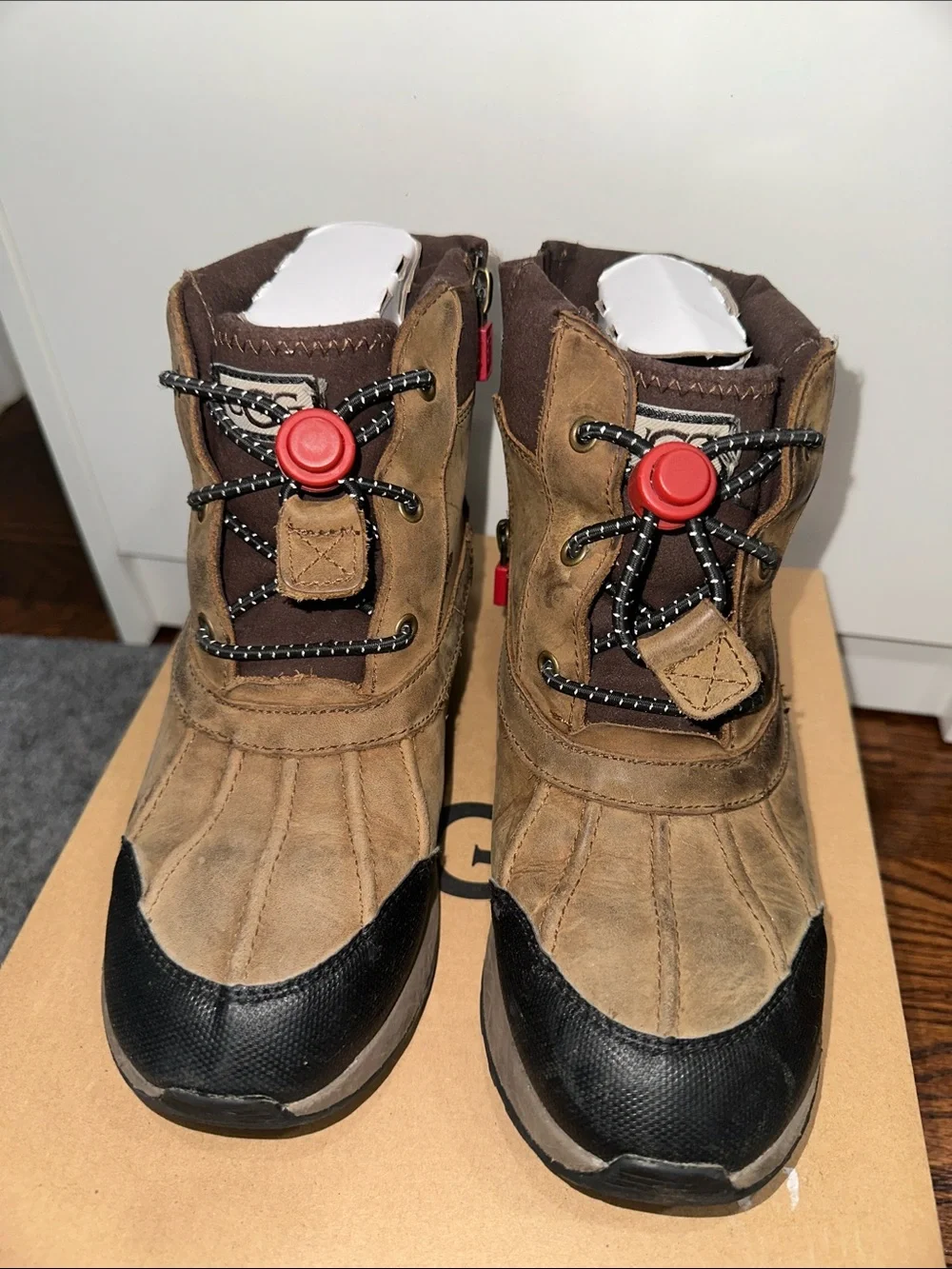 UGG Kids Brown and Black Winter Boots with Red Toggle